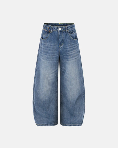 Baggy jeans with Paris-style buckle waist detail