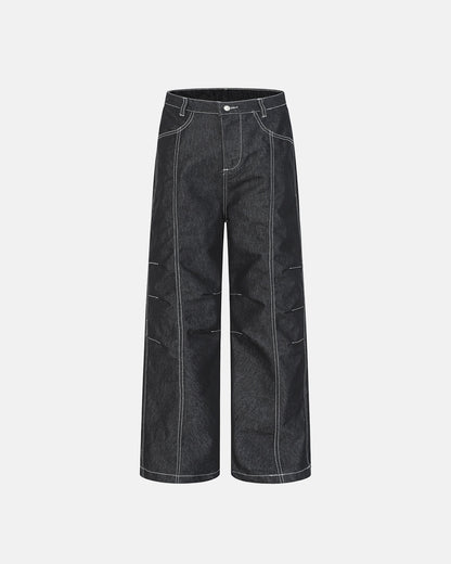 deconstructed pleated straight-leg jeans with structured seams and clean modern silhouette