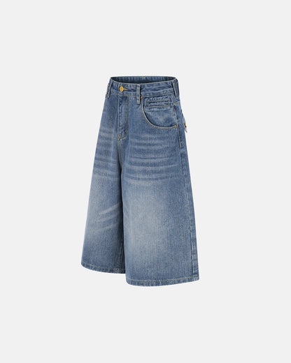 loose fit denim jorts with adjustable waist and longline silhouette